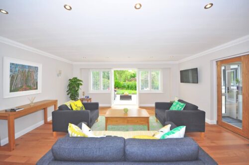 Living room leading onto patio in sophisticated home