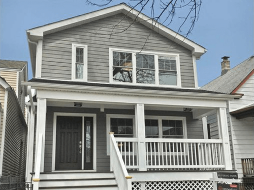 Gray Fletcher home with new porch after remodel