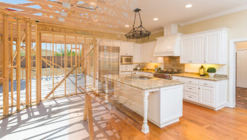 a new wall being constructed in a home's a modern kitchen